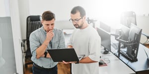 programmers working behind computer